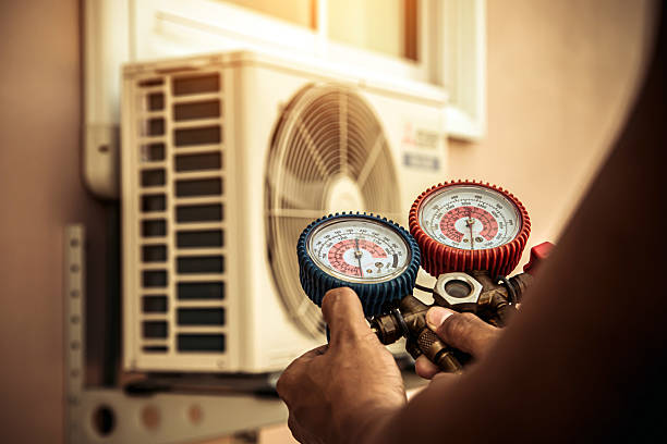 Professional Hvac technician working in Ozark, AR